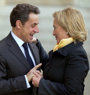 France's president Nicolas Sarkozy welcomes US Secretary of State Hillary Clinton prior to a meeting of Group of Eight powers, on March 14, 2011 at the Elysee Palace in Paris. AFP