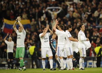Real Madrid's players celebrate at the end of the match Real Madrid vs Olympique Lyonnais. AFP