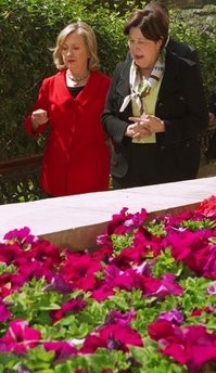 US Secretary of State Hillary Rodham Clinton, left, walks with US ambassador to Egypt Margaret Scoby during her visit to the US Embassy in Cairo, Egypt on Wednesday March 16, 2011