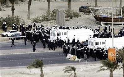 Gulf Cooperation Council (GCC) forces move in to Pearl Square to evacuate anti-government protesters in Manama March 16, 2011