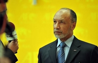 Asian Football Confederation president Mohammed bin Hammam gives an interview to a TV reporter after a press conference at the AFC house in Kuala Lumpur, on March 18. AFP