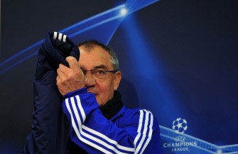 AFP file - Picture taken on November 23, 2010 shows Schalke's head coach Felix Magath taking off his jacket as he arrives for a press conference in Gelsenkirchen, western Germany