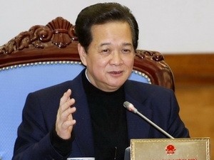 Prime Minister Nguyen Tan Dung at an online meeting between the cabinet members and local administrations on March 18