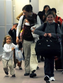 AFP - US passengers arrive at Taiwan's Taoyuan International Airport early on March 18, 2011. The first flight chartered by the United States took off from quake-hit Japan for Taiwan that day.