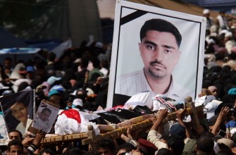Tens of thousands of anti-government Yemeni mourners walk in a mass funeral processsion on March 20, 2011 in Sanaa for activists who were among more than 50 protesters gunned down two days ago by snipers in the Yemeni capital. AFP