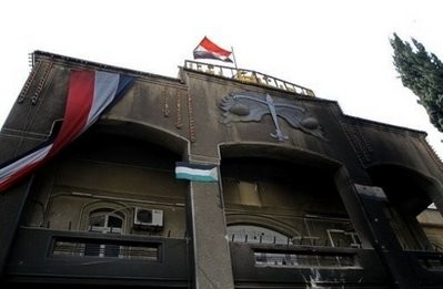 A courthouse torched by angry protesters in the southern town of Daraa, south of Damascus