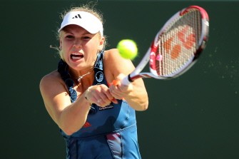 Caroline Wozniacki of Denmark hits a backhand return against Bethanie Mattek-Sands during the Sony Ericsson Open at Crandon Park Tennis Center on March 24, 2011 in Key Biscayne, Florida. AFP