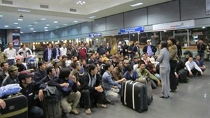 File photo shows a company offer jobs to workers from Libya.