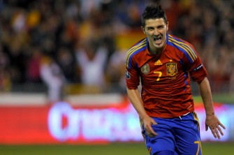 David Villa celebrates after scoring during their Euro 2012 qualifier round match Spain vs Czech Republic at Los Carmenes Stadium on March 25, 2011, in Granada. AFP