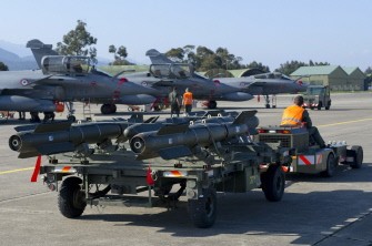 This handout picture released on March 25, 2011 by ECPAD (The French Defence Communication and Audiovisual Production Agency) shows lined-up Rafale jet fighters at Solenzara airbase in Corsica to take part in military operations in Libya. AFP
