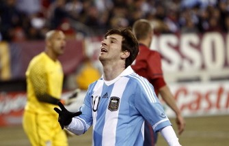 Lionel Messi of Argentina reacts after a failed scoring attempt during the first half of the friendly match. AFP