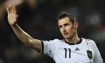 Germany's striker Miroslav Klose waves after the match Germany vs Kazakhstan on March 26, 2011. Germany won the match 4-0. AFP