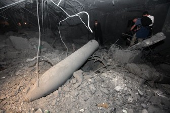 AFP - This image is on a tour organized by the Libyan government, and inspecting the damage to the Libyan leader Muammar Gaddafi house in the Area of Gargour
