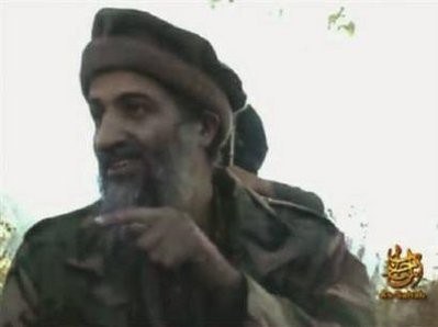 A video grab from an undated footage from the Internet shows Al Qaeda leader Osama bin Laden making statements from an unknown location.