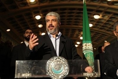 Senior Hamas Leader Khaled Mashaal talks gives a statement after a meeting with Arab League General Secretary Amr Mussa (not seen) in Cairo