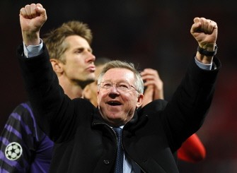 AFP - Manchester United manager Alex Ferguson celebrates as he leaves the pitch after the 4-1 victory