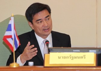 AFP - Thai Prime Minister Abhisit Vejjajiva gestures as talks during the last weekly cabinet meeting at Parliament in Bangkok on May 3, 2011. Thailand is preparing for elections expected to be called this week.