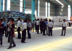 Visitors tour GreenFeed’s new factory in Dong Nai Province on May 5, 2011