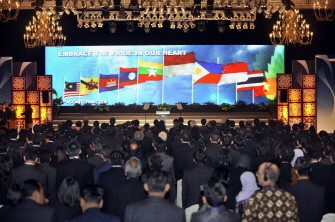 AFP - The flags of the 10-member countries of the Association of Southeast Asia Nations (ASEAN) are displayed on the stage during the opening ceremony for the 18th ASEAN Summit in Jakarta on May 7, 2011.