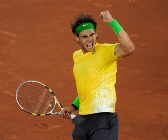 AFP - Rafael Nadal celebrates winning against Swiss Roger Federer after their semi-final match of the Madrid Masters on May 07, 2011