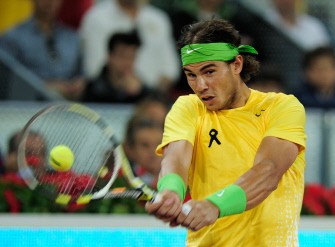 AFP - Rafael Nadal returns the ball against Swiss Roger Federer during their match