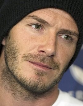 This file photo taken April 12, 2011, shows Los Angeles Galaxy soccer player David Beckham speaking to the media during a news conference in Toronto.