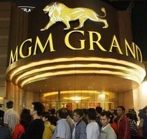 AFP/File – Crowds wait for the opening of the MGM Grand in Macau.