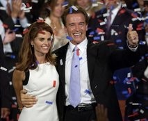 This file photo taken Oct. 7, 2003, shows Arnold Schwarzenegger and his wife, Maria Shriver