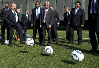 AFP - FIFA President Sepp Blatter (2ndL) plays with a ball next to Brazil's former team captain Cafu (far L) outside the FIFA headquarters prior to the inaugural meeting of the FIFA Task Force Football 2014 on May 10, 2011 in Zurich.