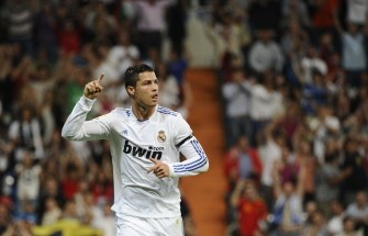 AFP- Real Madrid's forward Cristiano Ronaldo celebrates his first goal during their Spanish league football match Real Madrid vs Getafe on May 10, 2011 at the Santiago Bernabeu stadium in Madrid.