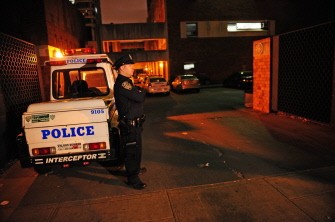AFP - A policeman stands in front of the New York police station in Harlem where Dominique Strauss-Kahn is allegedly held on May 14, 2011.