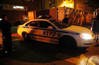 AFP - A police car leaves from the New York police station in Harlem where Dominique Strauss-Kahn is allegedly held on May 14, 2011.