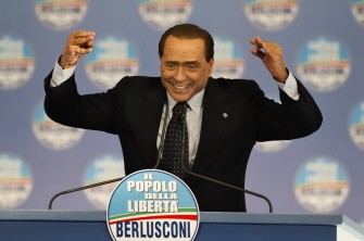 AFP - Italian Prime Minister Silvio Berlusconi gestures as he gives a speech during a convention of The People of Freedom Party (Popolo della Liberta) in Naples on May 13, 2011.