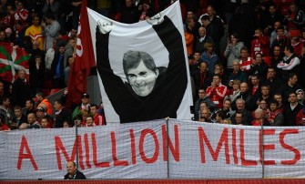 AFP - A banner depicting Liverpool's Scottish manager Kenny Dalglish is seen before his team's English Premier League football match against Tottenham Hotspur