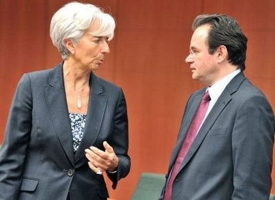 AFP - France's Finance Minister Christine Lagarde speaks with Greece's Finance Minister George Papaconstantinou before attending an Eurogroup meeting at the EU Headquarters in Brussels.