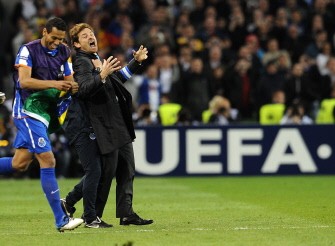 AFP - FC Porto's coach Andre Villas-Boas (R) celebrates with teammates their victory at the end of the UEFA Europa League final