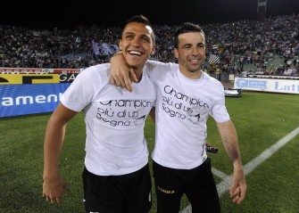 AFP - Udinese's forwards Alexis Sanchez (L) and Antonio Di Natale (R) celebrate after the Italian Serie A football match between Udinese and AC Milan