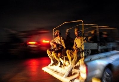 AFP - Pakistani soldiers enter the PNS Mehran naval air base following an attack by militants in Karachi.