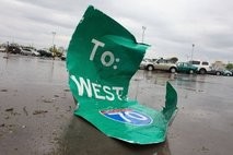 AFP /File – A highway sign sits in a parking lot at Lambert-St. Louis International Airport April 23, 2011