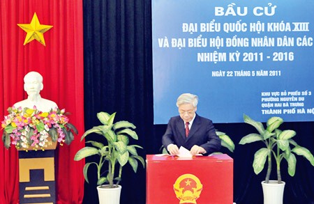 Communist Party of Vietnam General Secretary Nguyen Phu Trong casts a ballot at a polling station No. 3 at the Nguyen Du ward of the Hai Ba Trung precinct, Hanoi