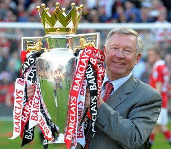AFP - Sir Alex Ferguson celebrates with the English Premier League trophy after their match against Blackpool at Old Trafford in Manchester on May 22, 2011