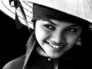 Girl's Smile by Vu Thi Tinh, gold medal at the int'l photo contest (VN-07).