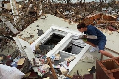 AFP - Lola Elbert helps look for items to salvage from her grandmother's house in Joplin, Missouri.