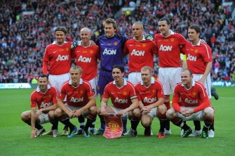 AFP - A Manchester United team including former players lines up for a picture before a testimonial football match against Juventus for United's Gary Neville's at Old Trafford in Manchester on May 24, 2011. (Back L-R) David Beckham, Nicky Butt, Tomasz Kuszczak, Wes Brown, John O'Shea and Michael Owen. (Front L-R) Ryan Giggs, Phil Neville, Gary Neville, Paul Scholes and Wayne Rooney.