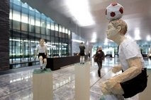 This file photo shows a sculpture of a football player at the entrance hall of FIFA headquarters in Zurich.