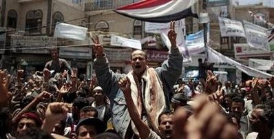 Anti-government protesters shout slogans during a rally to demand the ouster of Yemen's President Ali Abdullah Saleh in Sanaa May 30, 2011