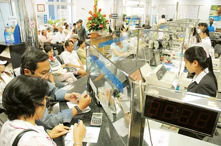 Ngân hàng Nhà nước không có chủ trương lập trần lãi suất cho vay. Ảnh: CAO THĂNG