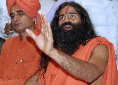 India's most celebrated yoga guru, Swami Baba Ramdev (R), has begun a fast unto death in a bid to force the government to accept his hardline anti-corruption measures.