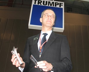 (File) Hans-Peter Laubscher, managing director of TRUMP, Asia Pacific, introduces his company’s latest technologies at the MTA Vietnam 2010 show on July 6, 2010 in Ho Chi Minh City. The German corporation has registered to join MTA Vietnam 2011. (Photo: Tuong Vy)