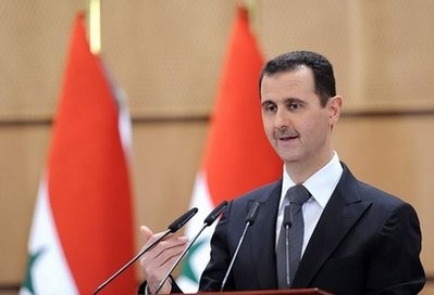 A handout picture released by the official Syrian Arab News Agency (SANA) shows Syria's President Bashar al-Assad addressing the nation from Damascus University in the Syrian capital
